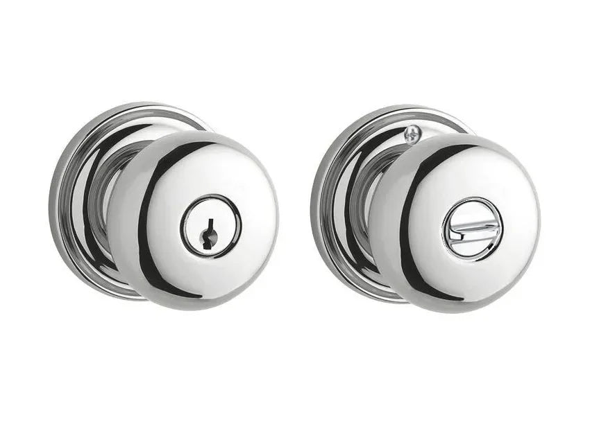 The Baldwin Reserve Round Knob with Traditional Round Rosette in Polished Chrome finish.