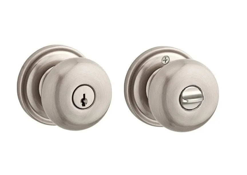 The Baldwin Reserve Round Knob with Traditional Round Rosette in Satin Nickel finish.