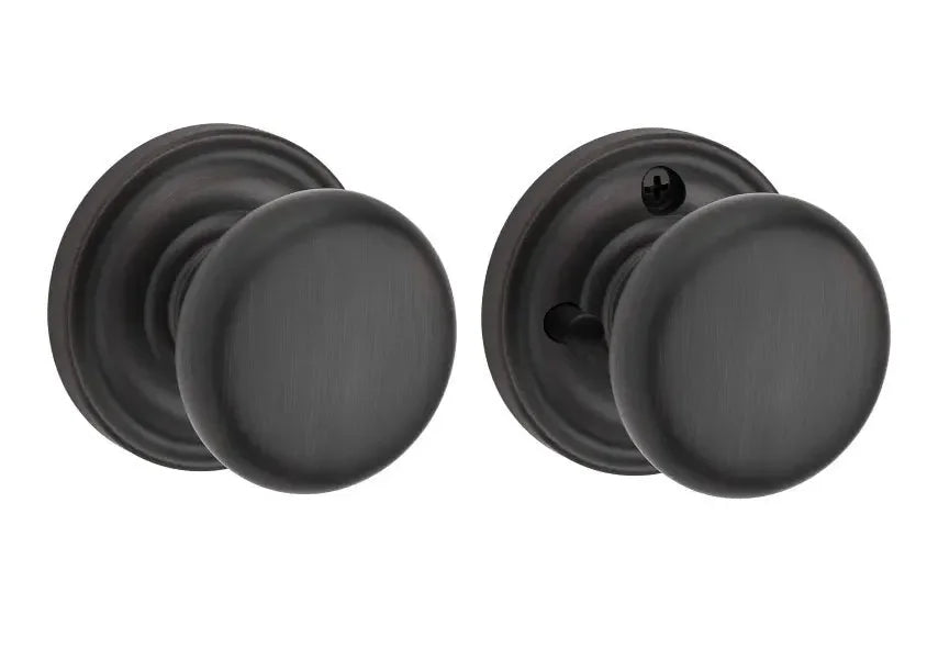The Baldwin Reserve Round Knob with Traditional Round Rosette in Venetian Bronze finish.