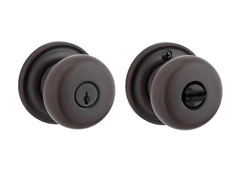 The Baldwin Reserve Round Knob with Traditional Round Rosette in Venetian Bronze finish.