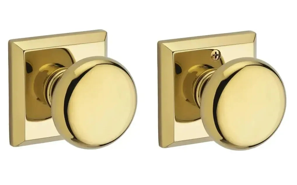 Baldwin Round Knob with Traditional Square Rosette in Lifetime Polished Brass finish