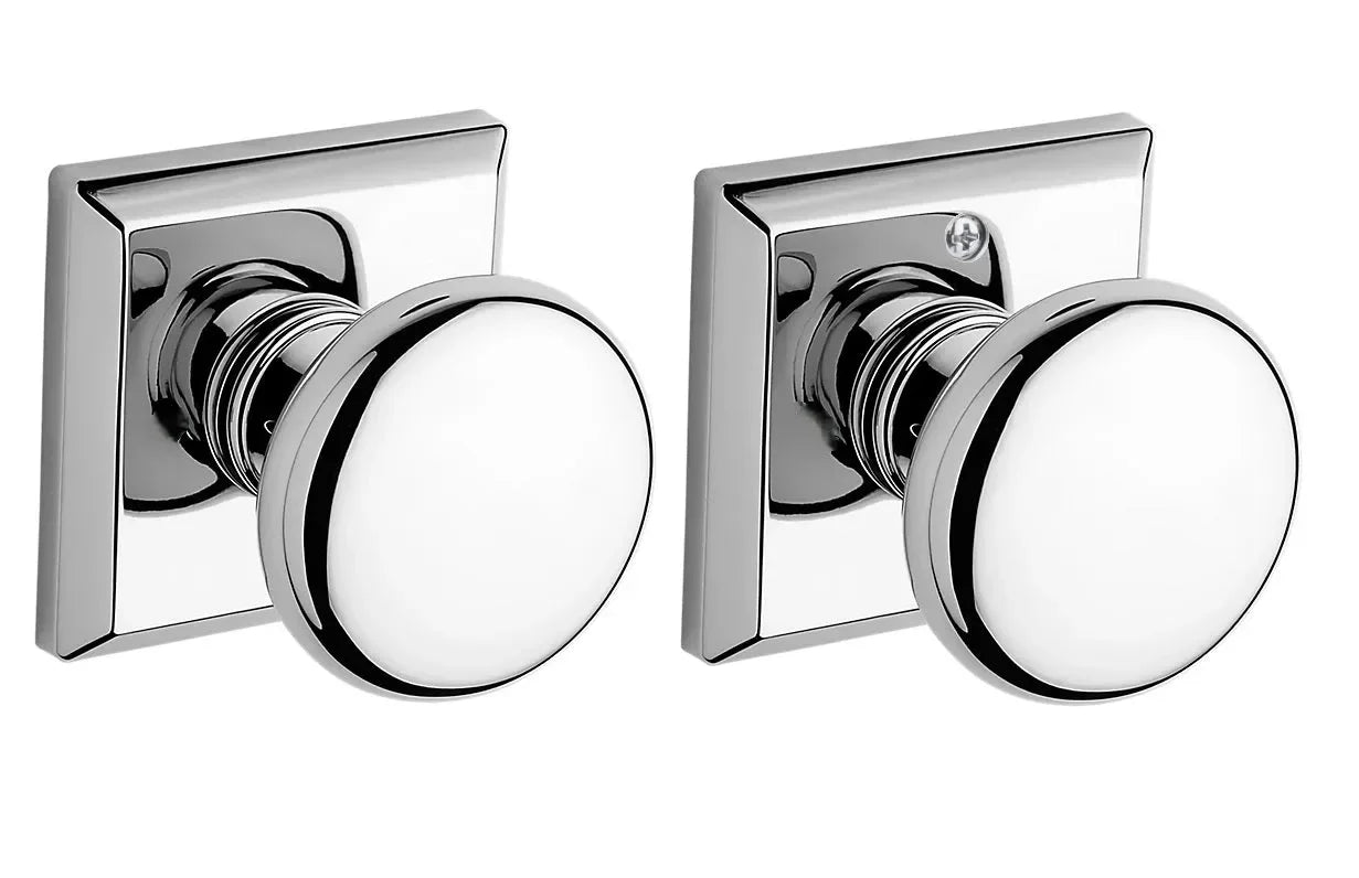 The Baldwin Reserve Round Knob with Traditional Square Rosette in Polished Chrome finish.