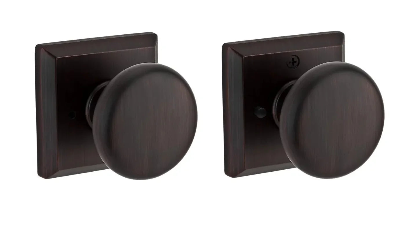 The Baldwin Reserve Round Knob with Traditional Square Rosette in Venetian Bronze finish.