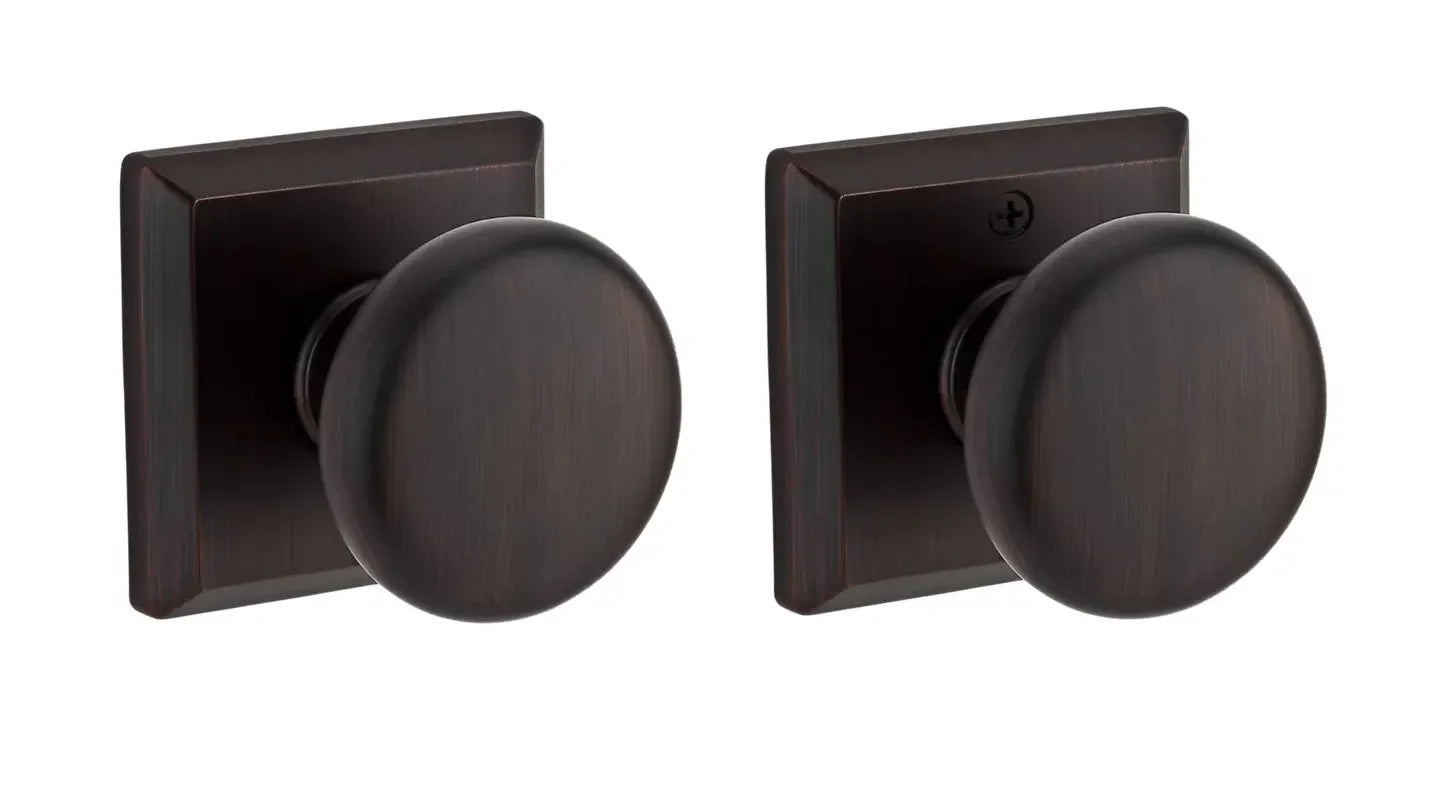 The Baldwin Reserve Round Knob with Traditional Square Rosette in Venetian Bronze finish.