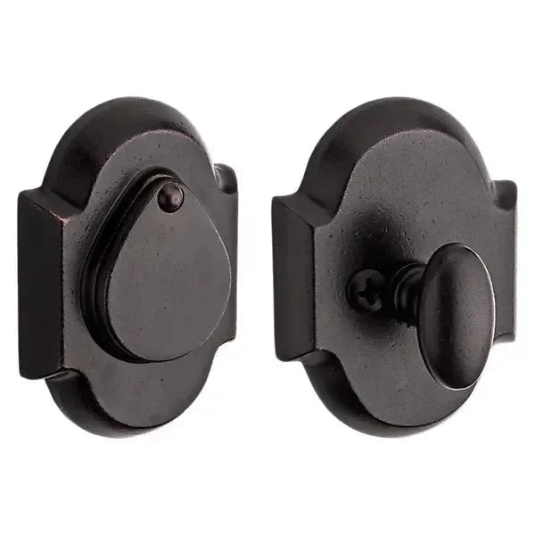 The Baldwin Reserve Rustic Arch Deadbolt in Dark Bronze finish.