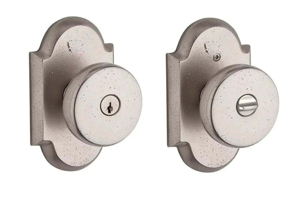 Baldwin Rustic Knob with Rustic Arch Rosette White Bronze