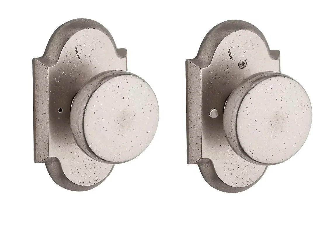 Baldwin Rustic Knob with Rustic Arch Rosette White Bronze