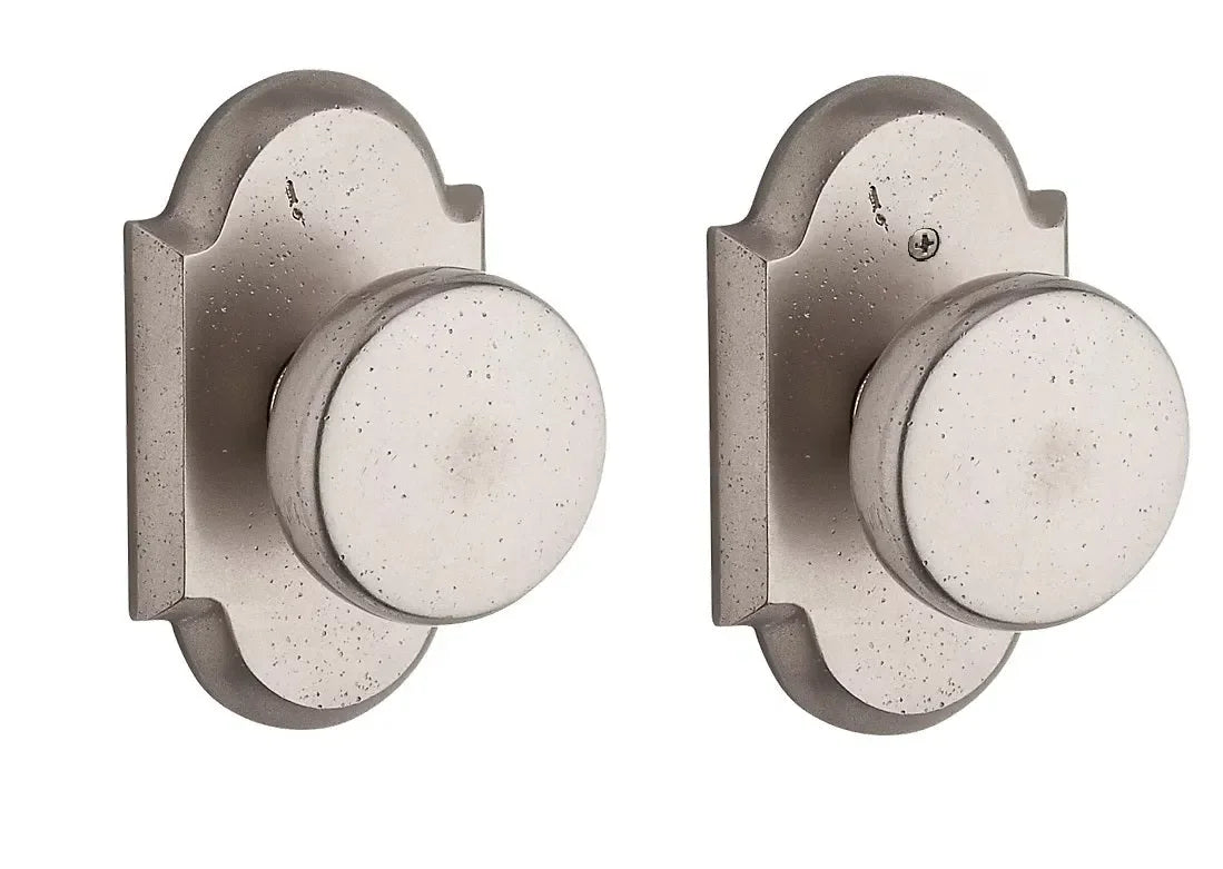 Baldwin Rustic Knob with Rustic Arch Rosette White Bronze