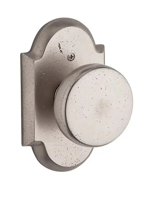 Baldwin Rustic Knob with Rustic Arch Rosette White Bronze