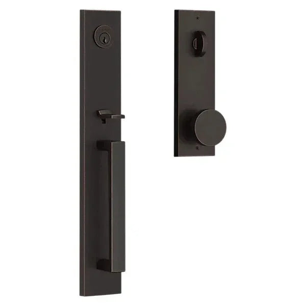 The Baldwin Reserve Santa Cruz Handleset with Interior Contemporary Knob with Contemporary Square Escutcheon in Venetian Bronze finish.