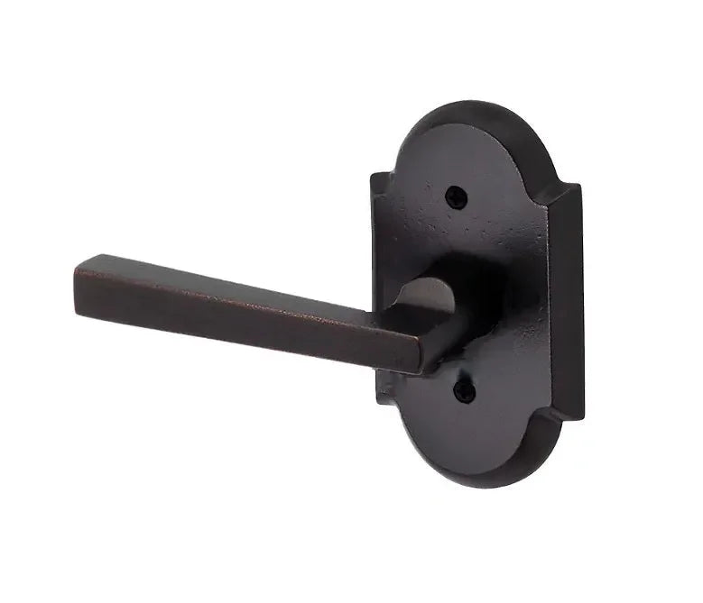 The Baldwin Reserve Taper Lever with Rustic Arch Rosette in Dark Bronze finish.