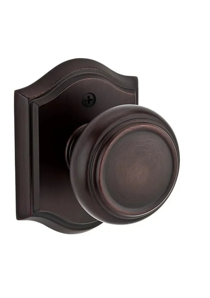 Baldwin Traditional Knob with Traditional Arch Rosette Venetian Bronze