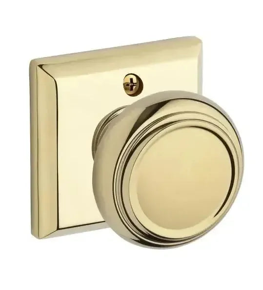 Baldwin Traditional Knob with Traditional Square Rosette in Lifetime Polished Brass finish