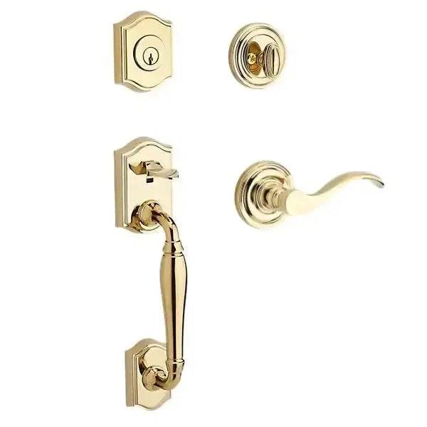 Baldwin Westcliff Handleset with Interior Curve Lever with Traditional Round Rosette in Lifetime Polished Brass finish