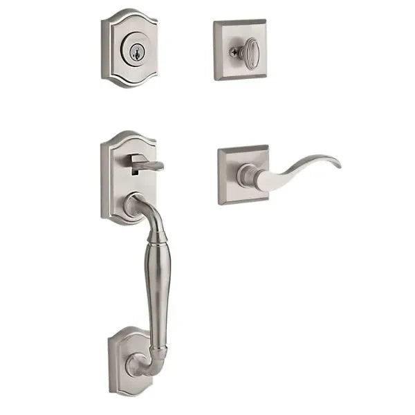 The Baldwin Reserve Westcliff Handleset with Interior Curve Lever with Traditional Square Rosette in Lifetime Satin Nickel finish.