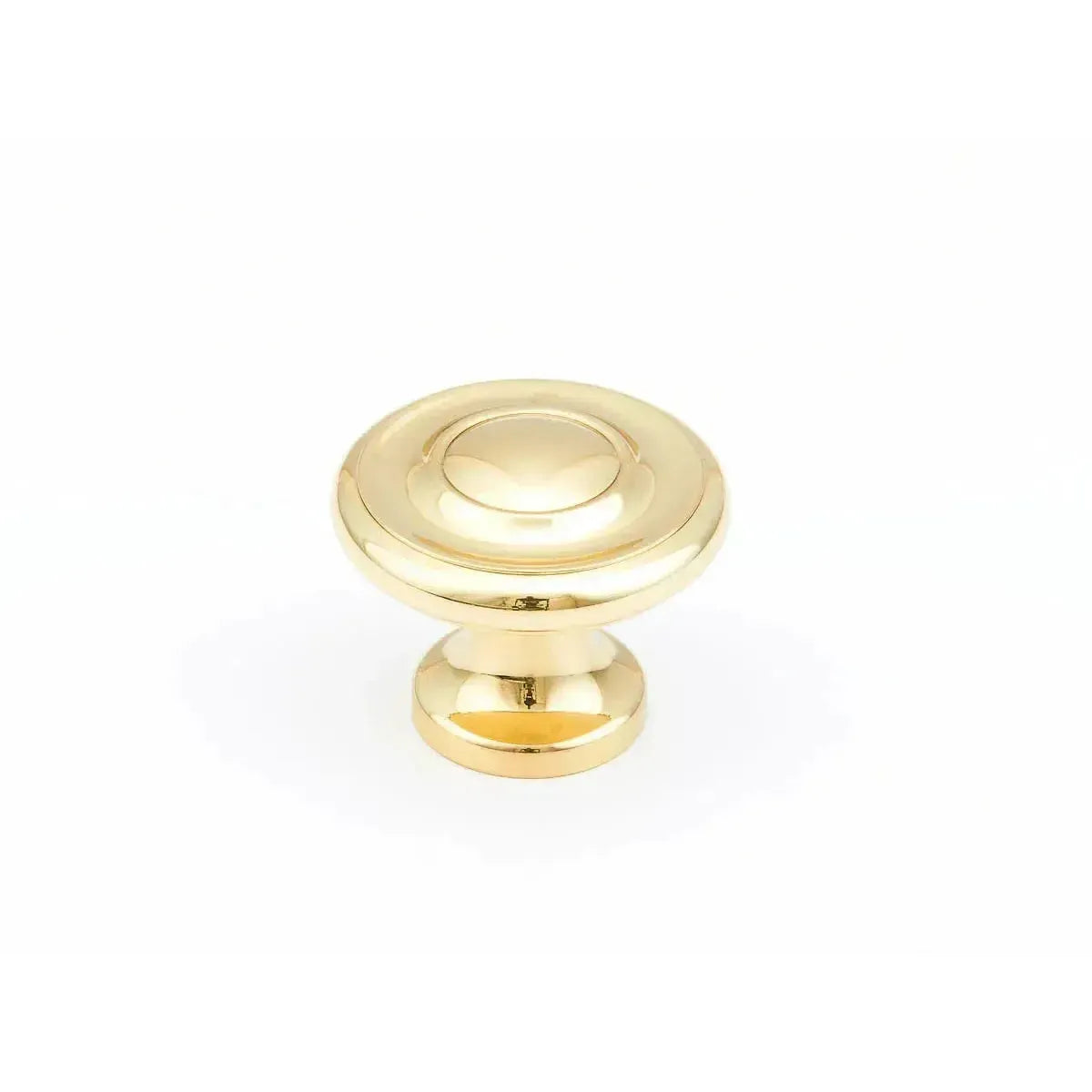 The Schaub Traditional Stepped Round Cabinet Knob in Polished Brass finish.