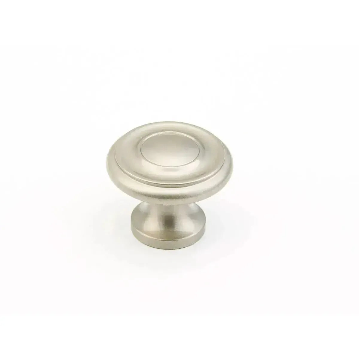 The Schaub Traditional Stepped Round Cabinet Knob in Satin Nickel finish.