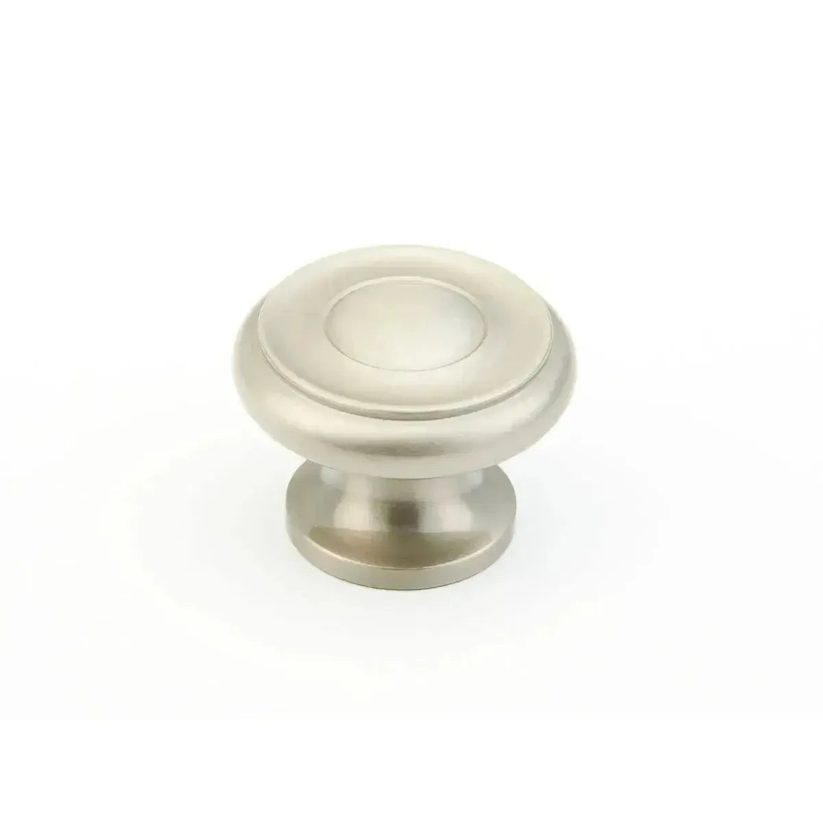 The Schaub Traditional Stepped Round Cabinet Knob in Satin Nickel finish.