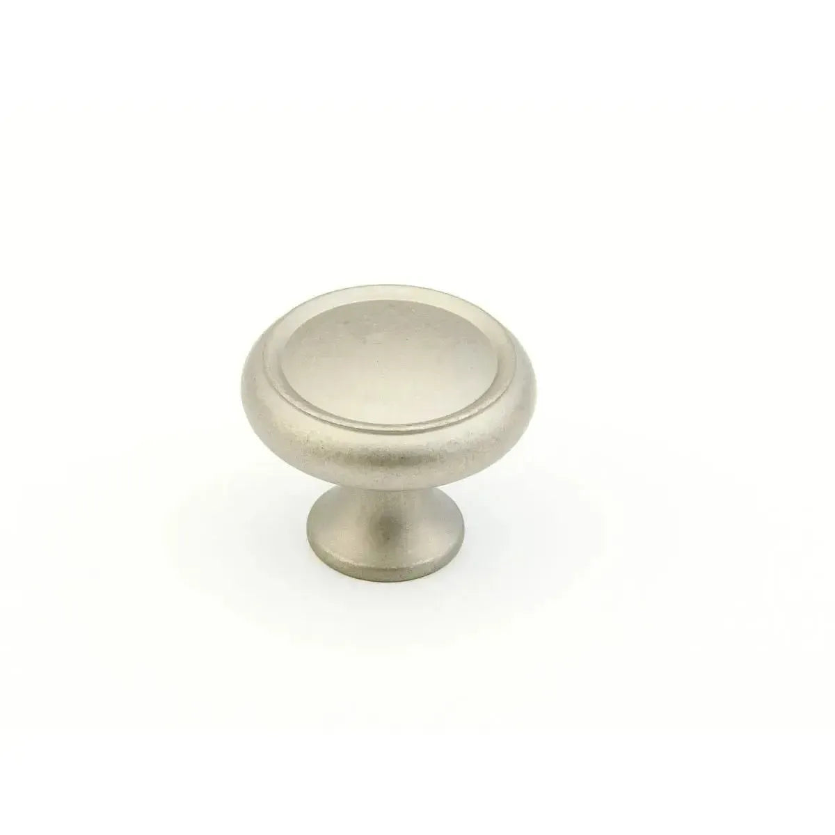 The Schaub Country Rimmed Round Cabinet Knob in Distressed Nickel finish.