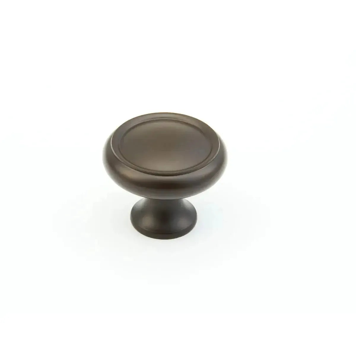 The Schaub Country Rimmed Round Cabinet Knob in Oil Rubbed Bronze finish.