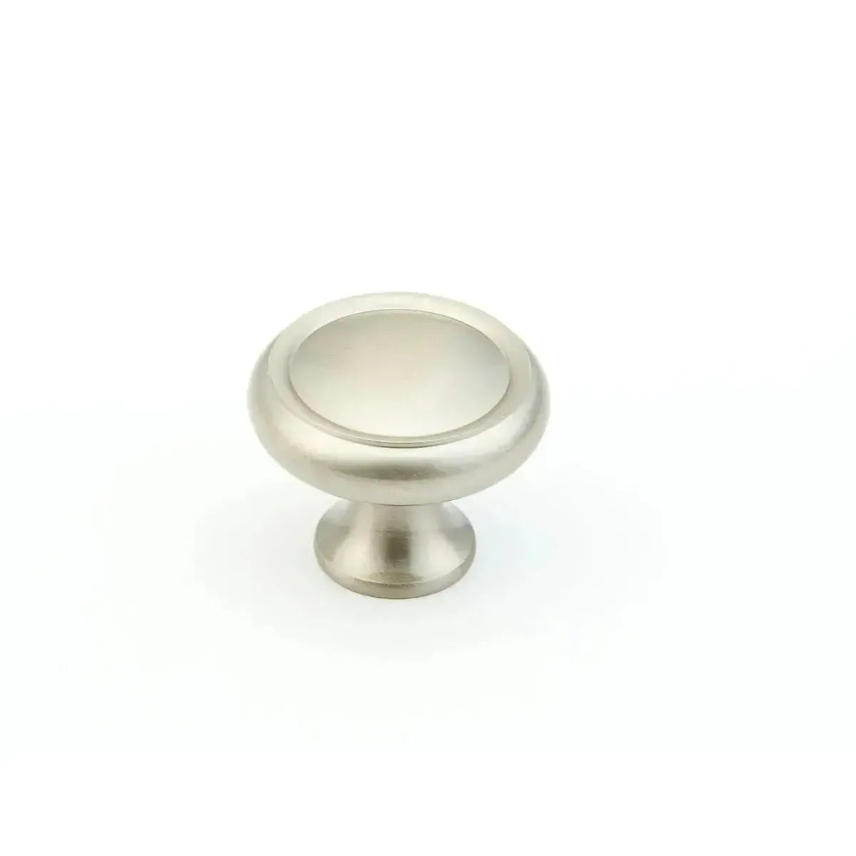 The Schaub Country Rimmed Round Cabinet Knob in Satin Nickel finish.