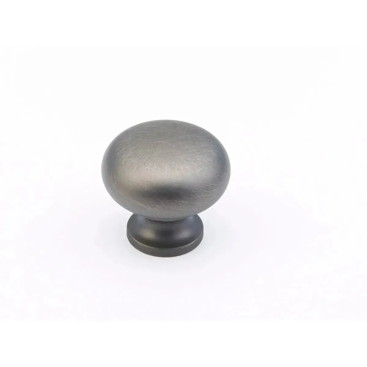 The Schaub Traditional Round Cabinet Knob in Antique Nickel finish.