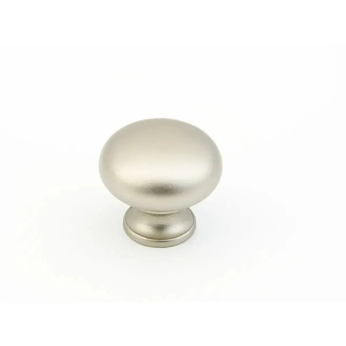 The Schaub Traditional Round Cabinet Knob in Distressed Nickel finish.