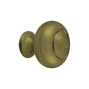 Deltana 1 1/4" Round Knob with Groove in Antique Brass finish
