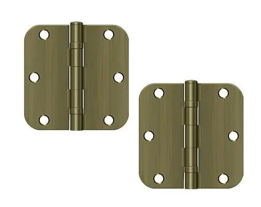 The Deltana 3-1/2" x 3-1/2" x 5/8" Radius Corner Ball Bearing Hinge, Residential in Antique Brass finish.