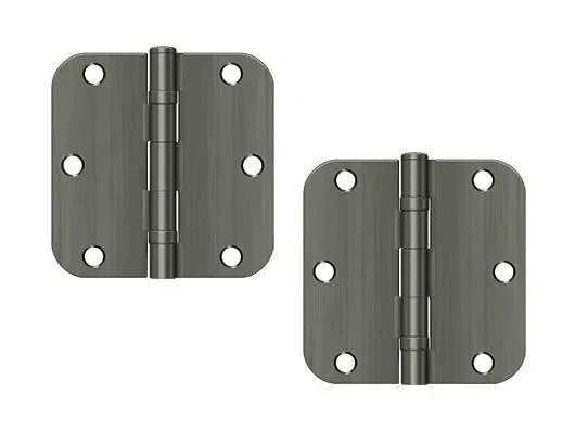 The Deltana 3-1/2" x 3-1/2" x 5/8" Radius Corner Ball Bearing Hinge, Residential in Antique Nickel finish.