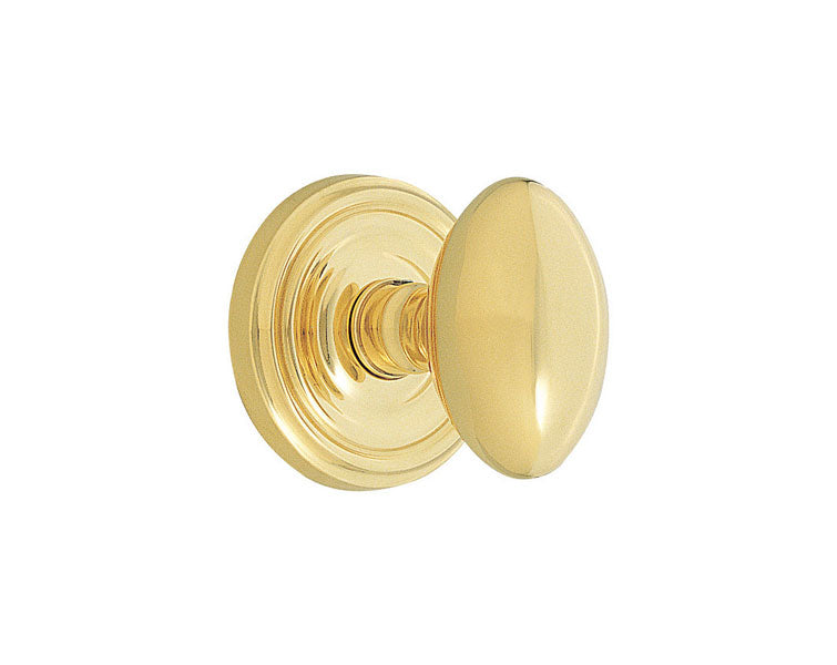 Emtek Egg Knob with Regular Rosette in Unlacquered Brass finish