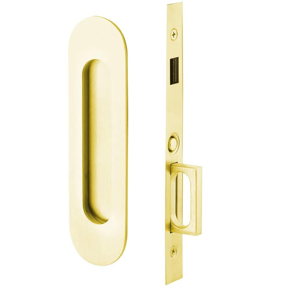 Emtek Dummy Narrow Oval Pocket Door Mortise Lock in Unlacquered Brass finish