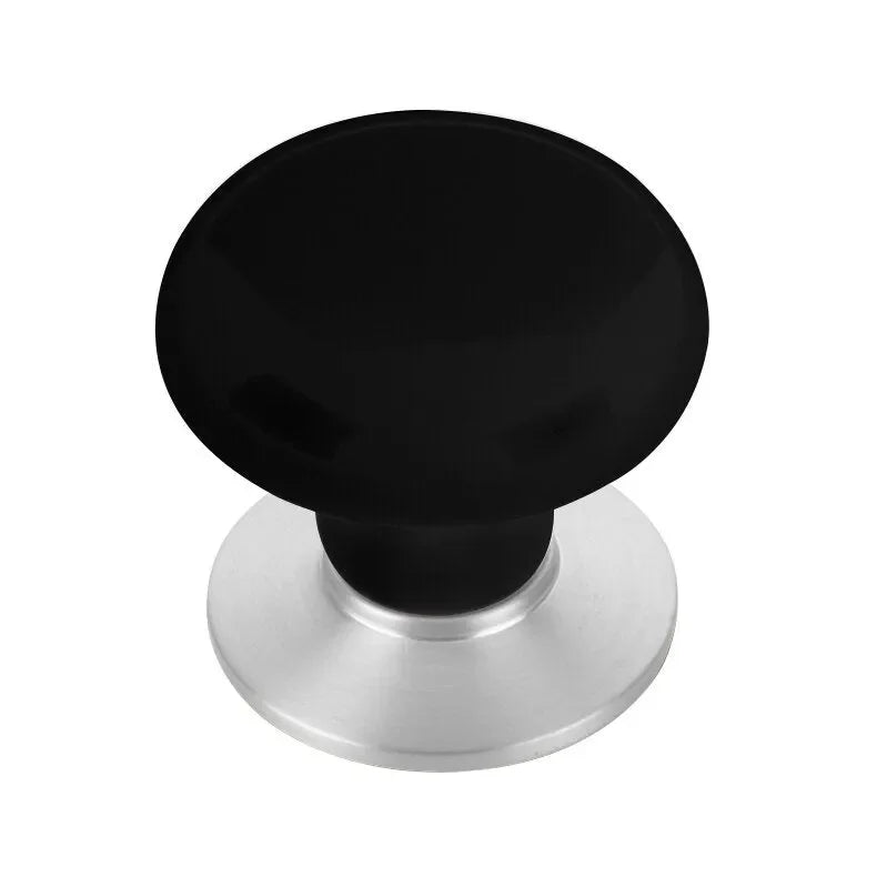 The Emtek Ebony Porcelain Cabinet Knob in Polished Chrome finish