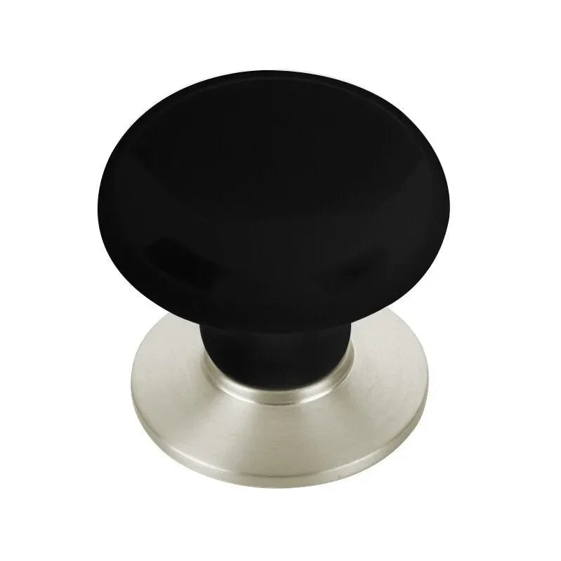 The Emtek Ebony Porcelain Cabinet Knob in Satin Nickel finish