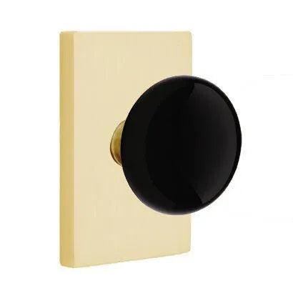 Emtek Ebony Porcelain Knob with Modern Rectangular Rosette in Satin Brass finish