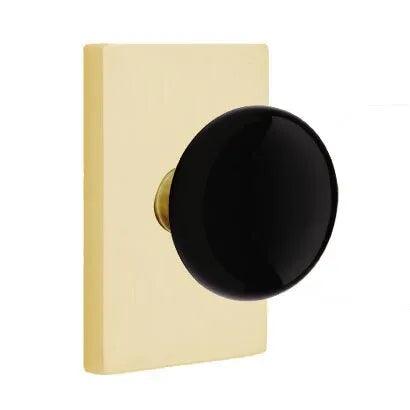 Emtek Ebony Porcelain Knob with Modern Rectangular Rosette in Satin Brass finish