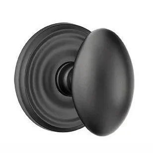 The Emtek Egg Knob with Regular Rosette in Flat Black finish.
