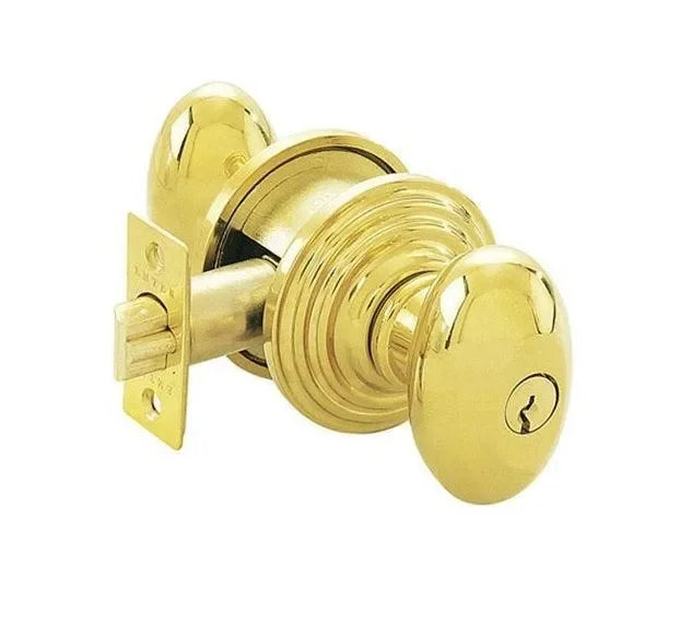 The Emtek Egg Knob with Regular Rosette in Unlacquered Brass finish.