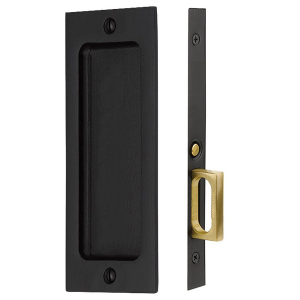 The Emtek Passage Rustic Modern Rectangular Pocket Door Mortise Lock in Flat Black Bronze Patina finish