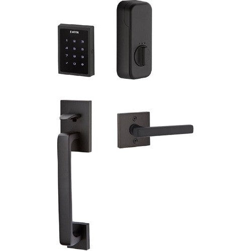 The Emtek Electronic EMPowered Motorized Touchscreen Keypad Entry Set With Baden Grip and Freestone Lever in Flat Black finish