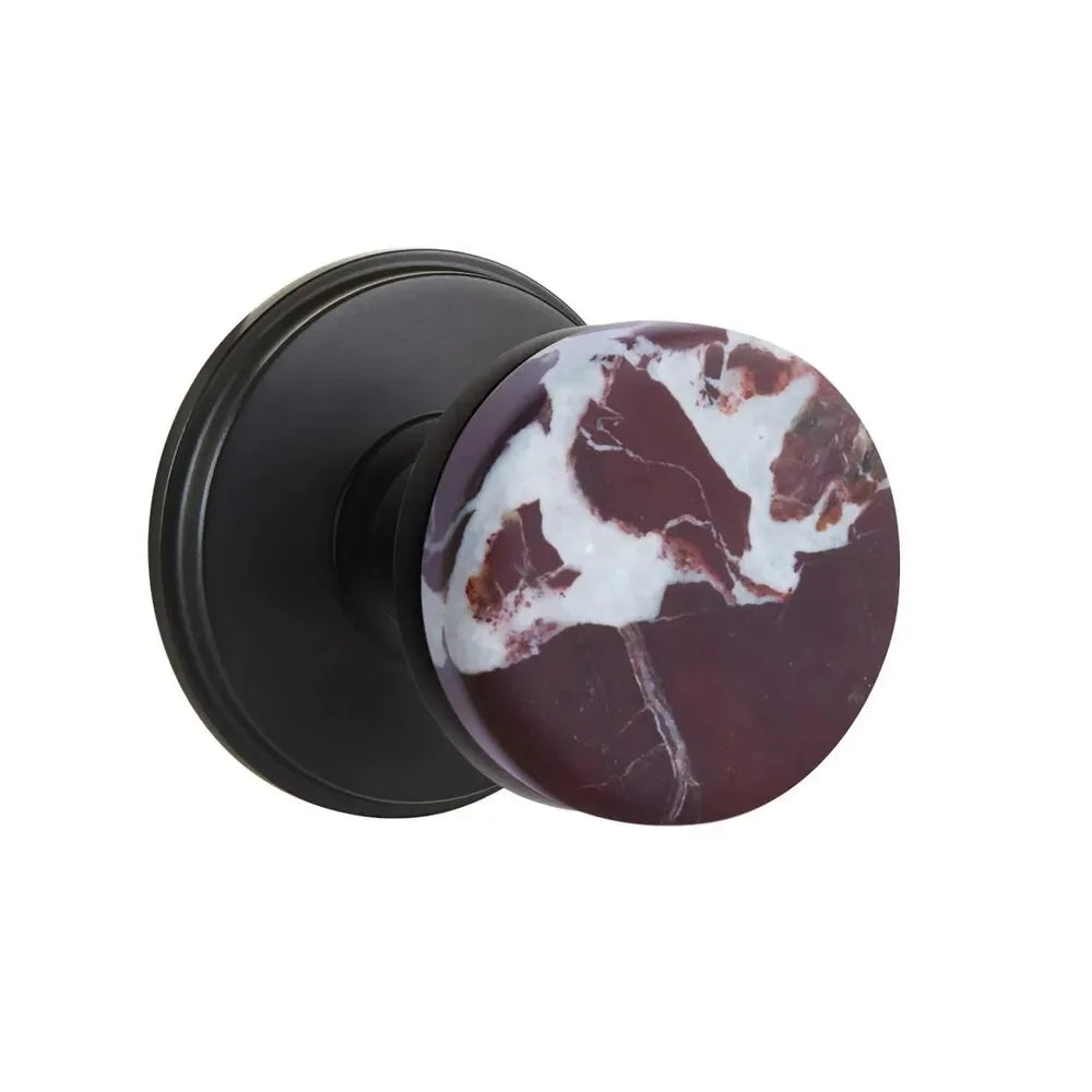 The Emtek Select Conical Rosso Levanto Marble Knobset with Watford Rosette in Flat Black finish.
