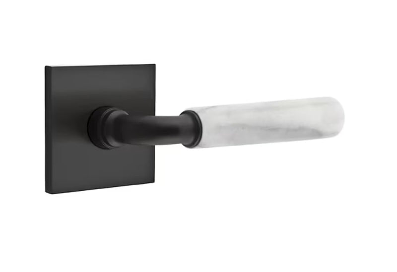 The Emtek Select R-Bar White Marble Lever with Square Rosette in Flat Black finish.