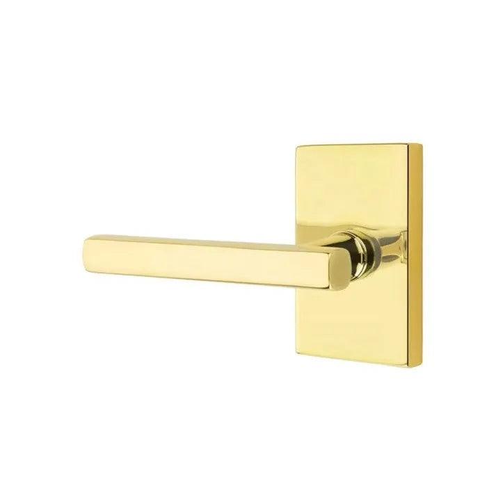 Emtek Freestone Lever With Modern Rectangular Rosette in Unlacquered Brass finish