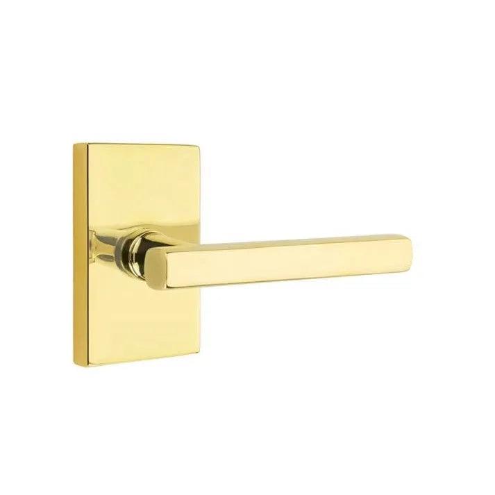 Emtek Freestone Lever With Modern Rectangular Rosette in Unlacquered Brass finish