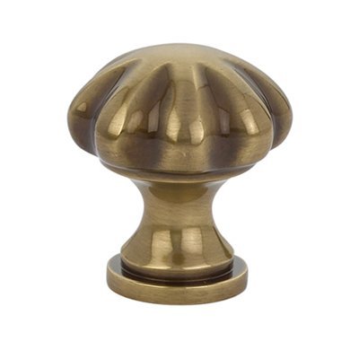 The Emtek Melon Cabinet Knob in French Antique finish.