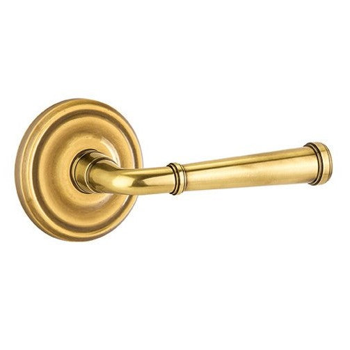 The Emtek Merrimack Lever With Regular Rosette in French Antique finish