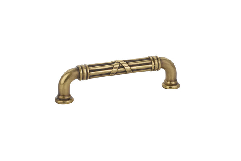 The Emtek Ribbon & Reed Estate Cabinet Pull, 4" Center to Center in French Antique finish