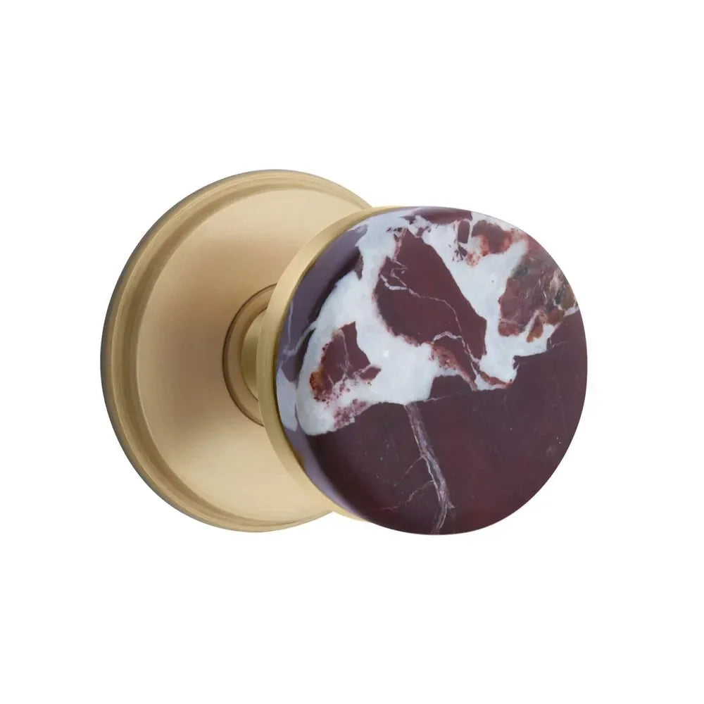 The Emtek Select Conical Rosso Levanto Marble Knobset with Watford Rosette in French Antique finish.