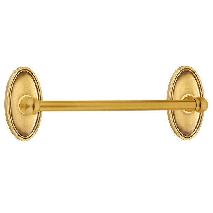 The Emtek Traditional Brass Towel Bar with Oval Rosette in French Antique finish.