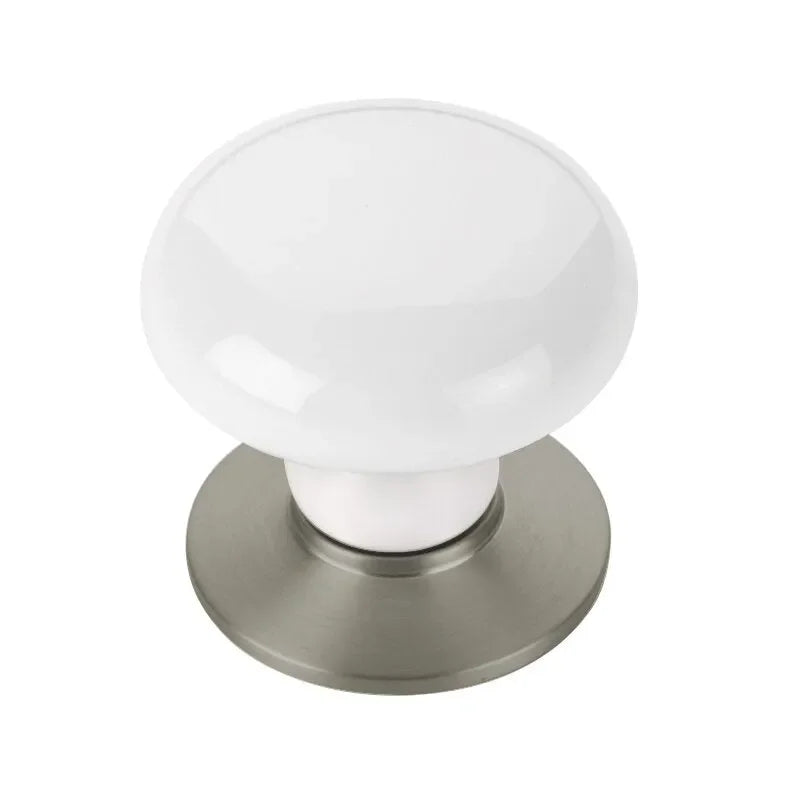 The Emtek Ice White Porcelain Cabinet Knob in Pewter finish